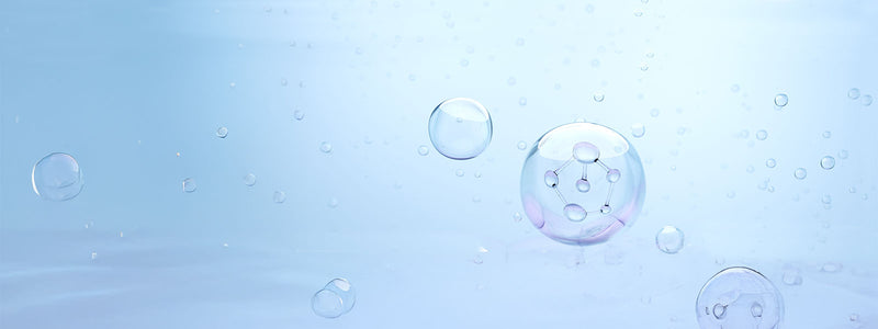 Transparent bubbles on a light blue gradient background