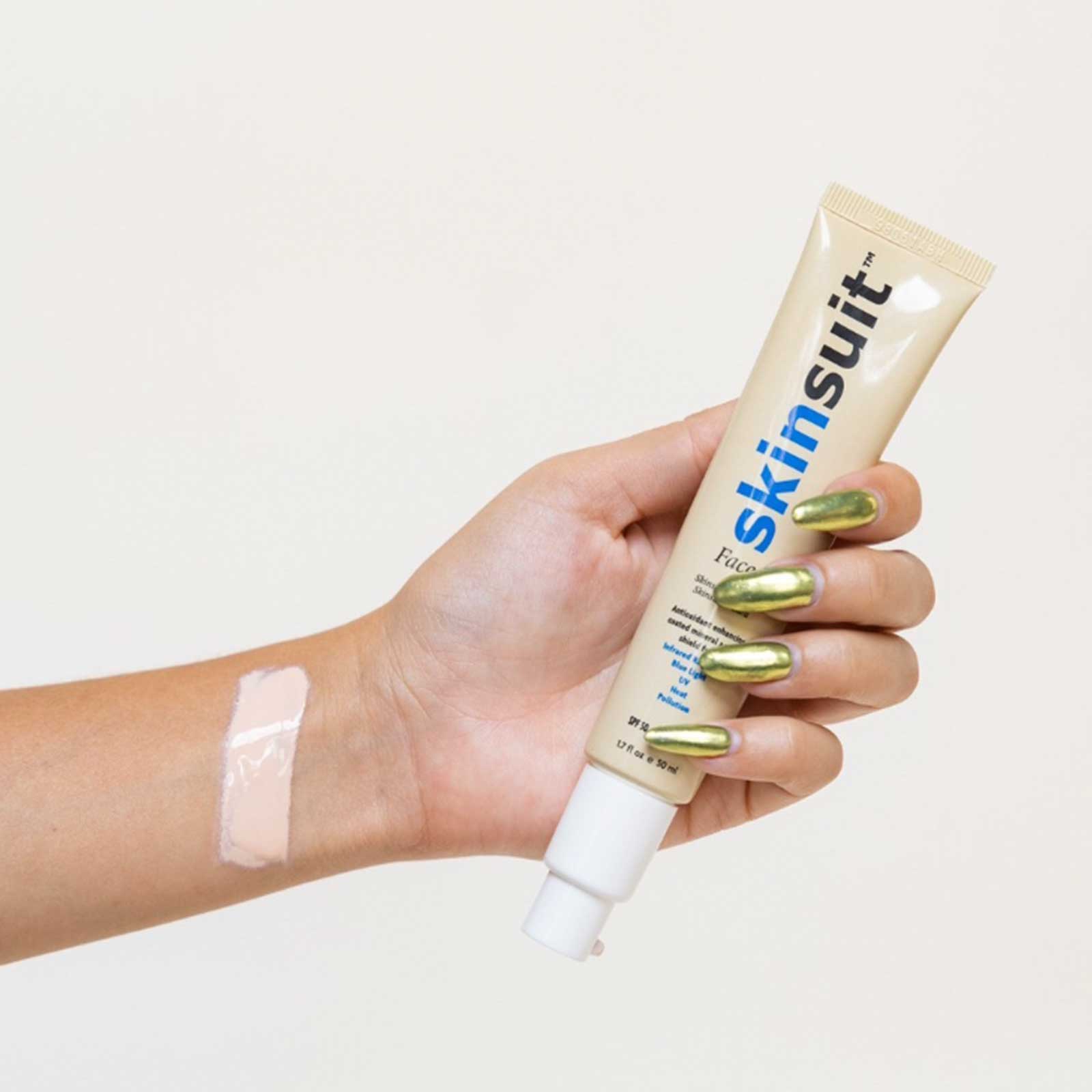 A Girl Holding Skinsuit Cream
