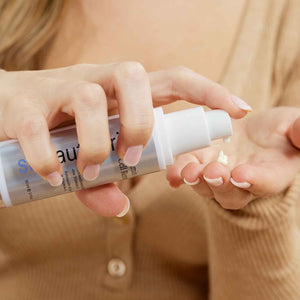 A Girl Applying Vitamin A Retinol Renewal