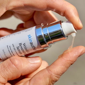 A Girl Applying Complete Serum